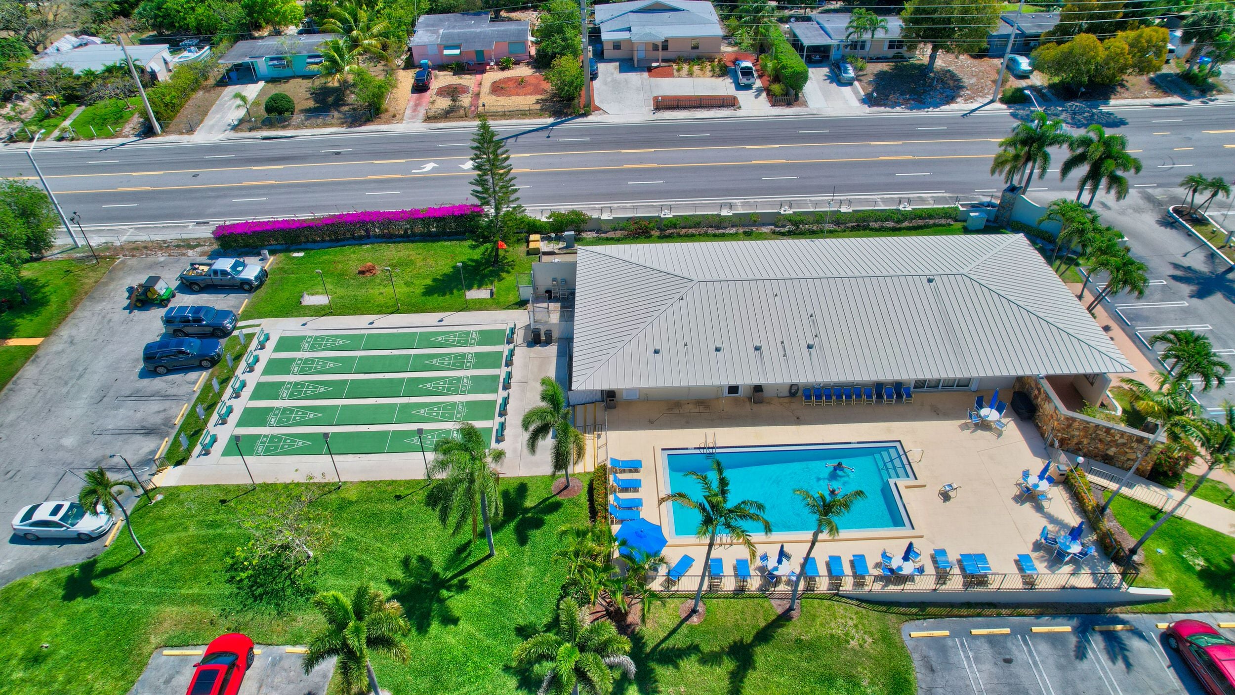 Aerial view of the Pine Point Villas pool and shuffleboard courts