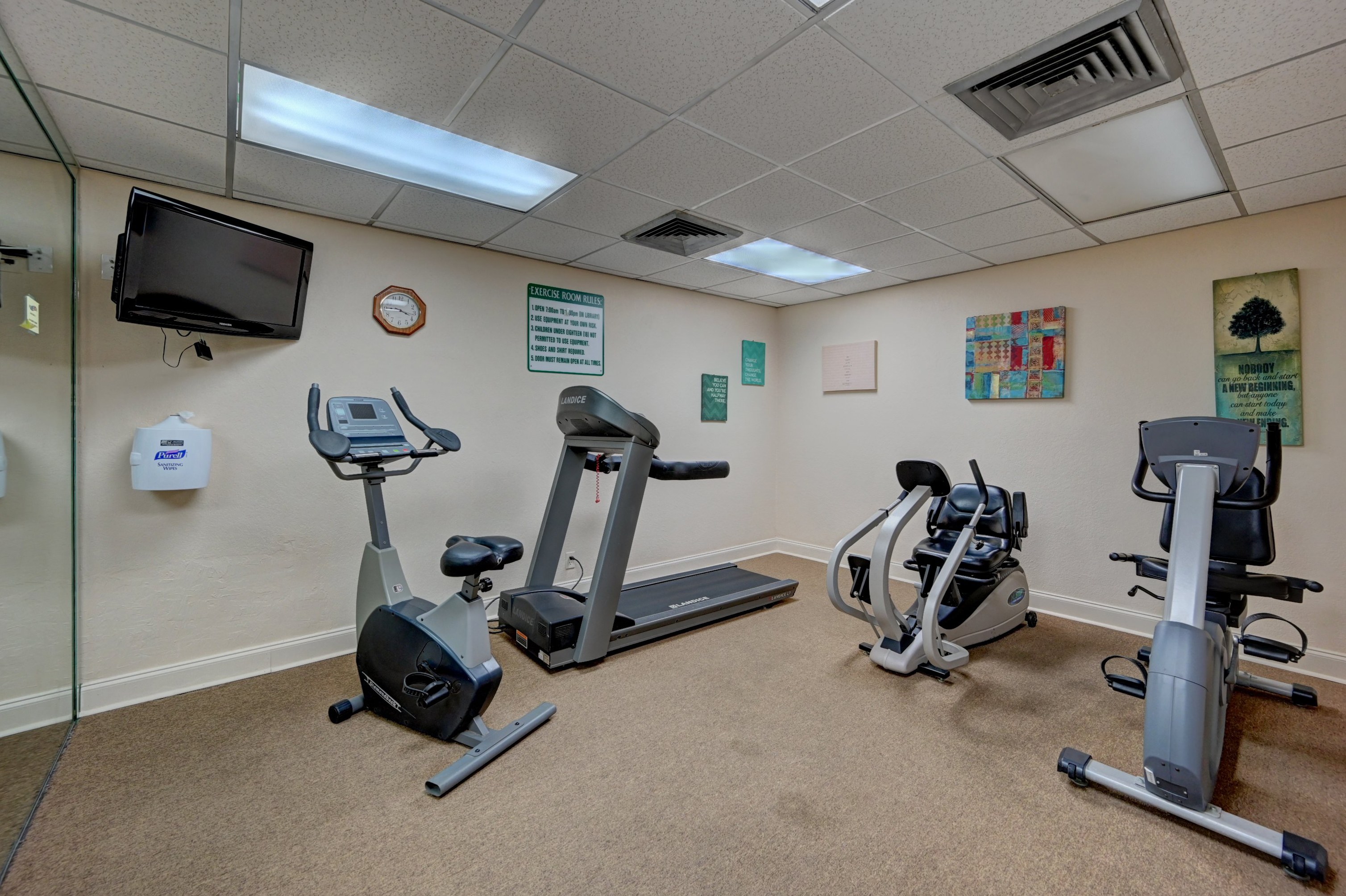 Pines of Delray fitness room with cardio equipment