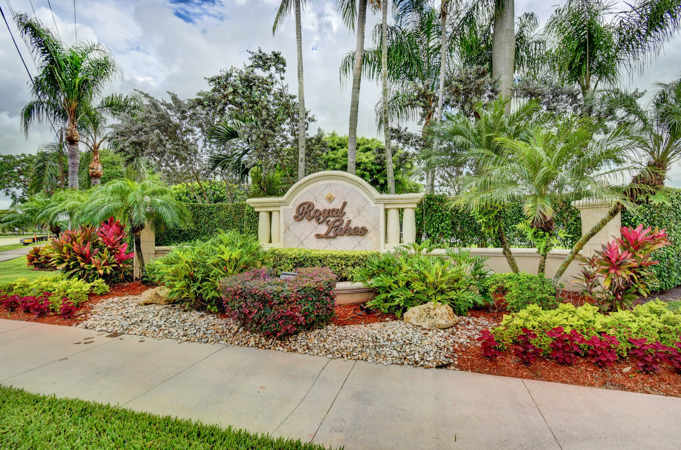Landscaped Royal Lakes entrance sign