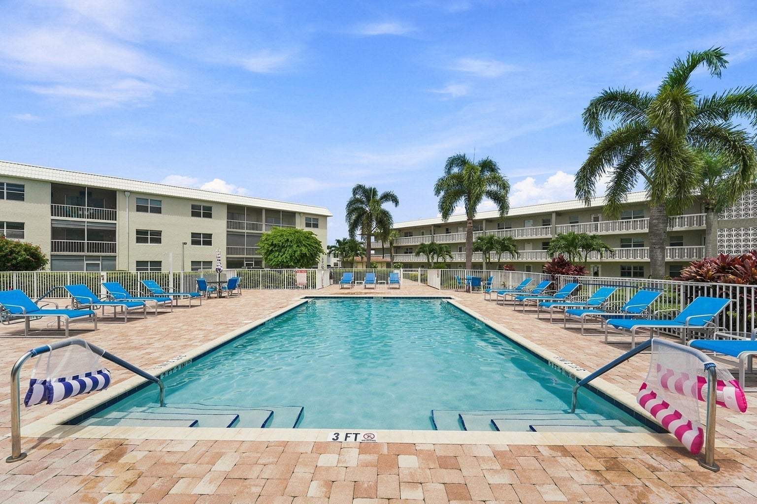 Sandalfoot South pool with steps and lounge chairs