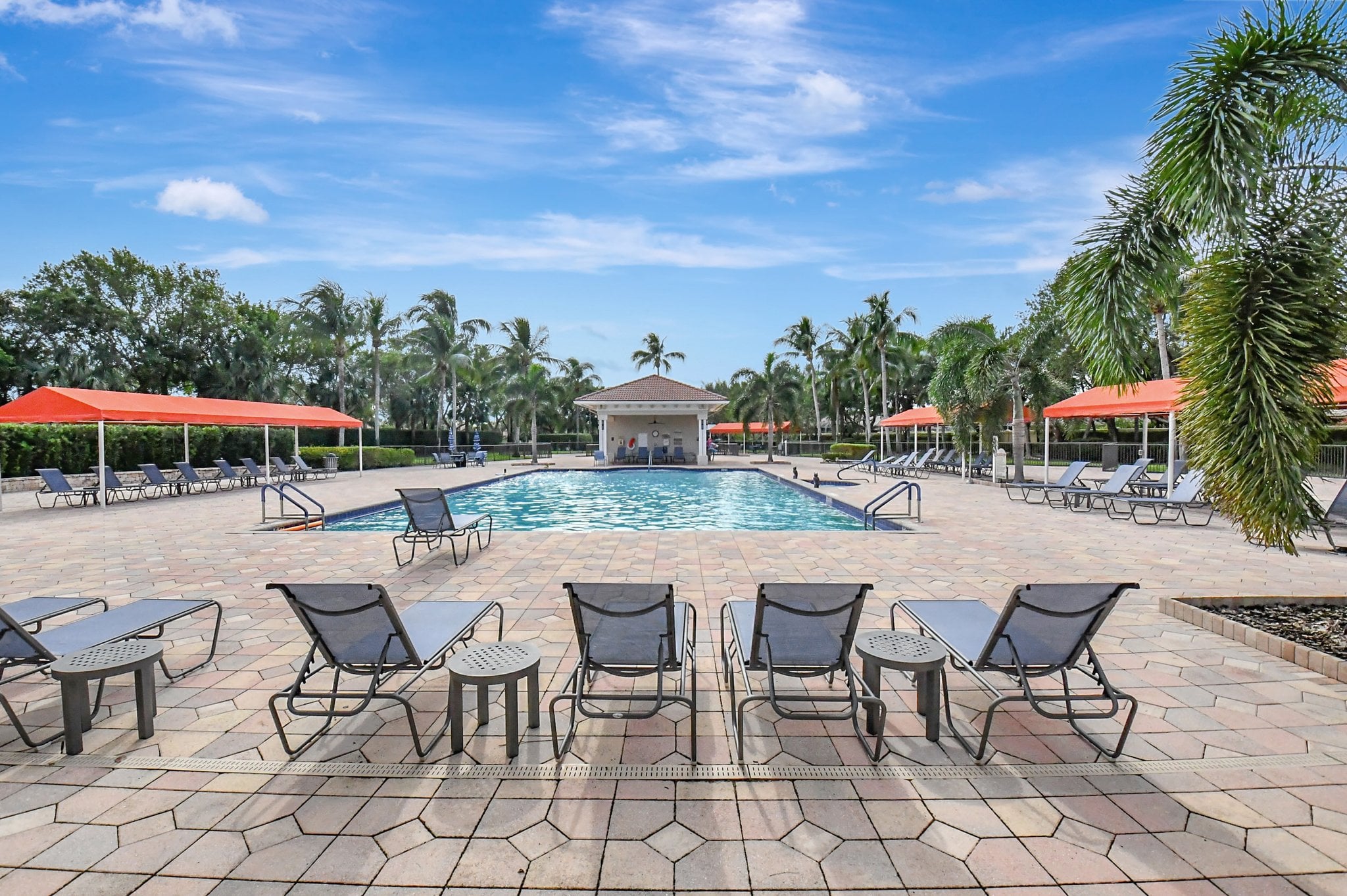 Outdoor swimming pool and sundeck at Tivoli Lakes