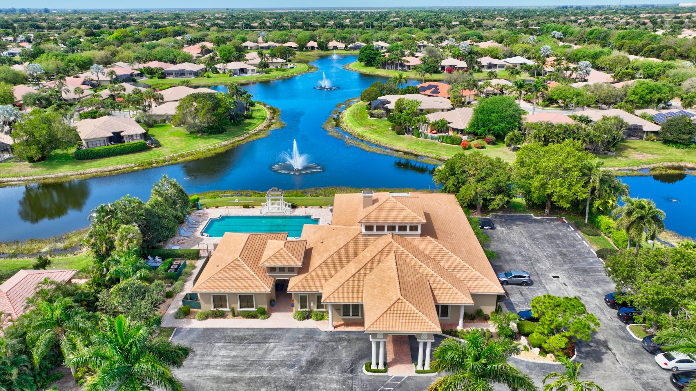 Aerial view of the Tivoli Reserve clubhouse overlooking community lakes
