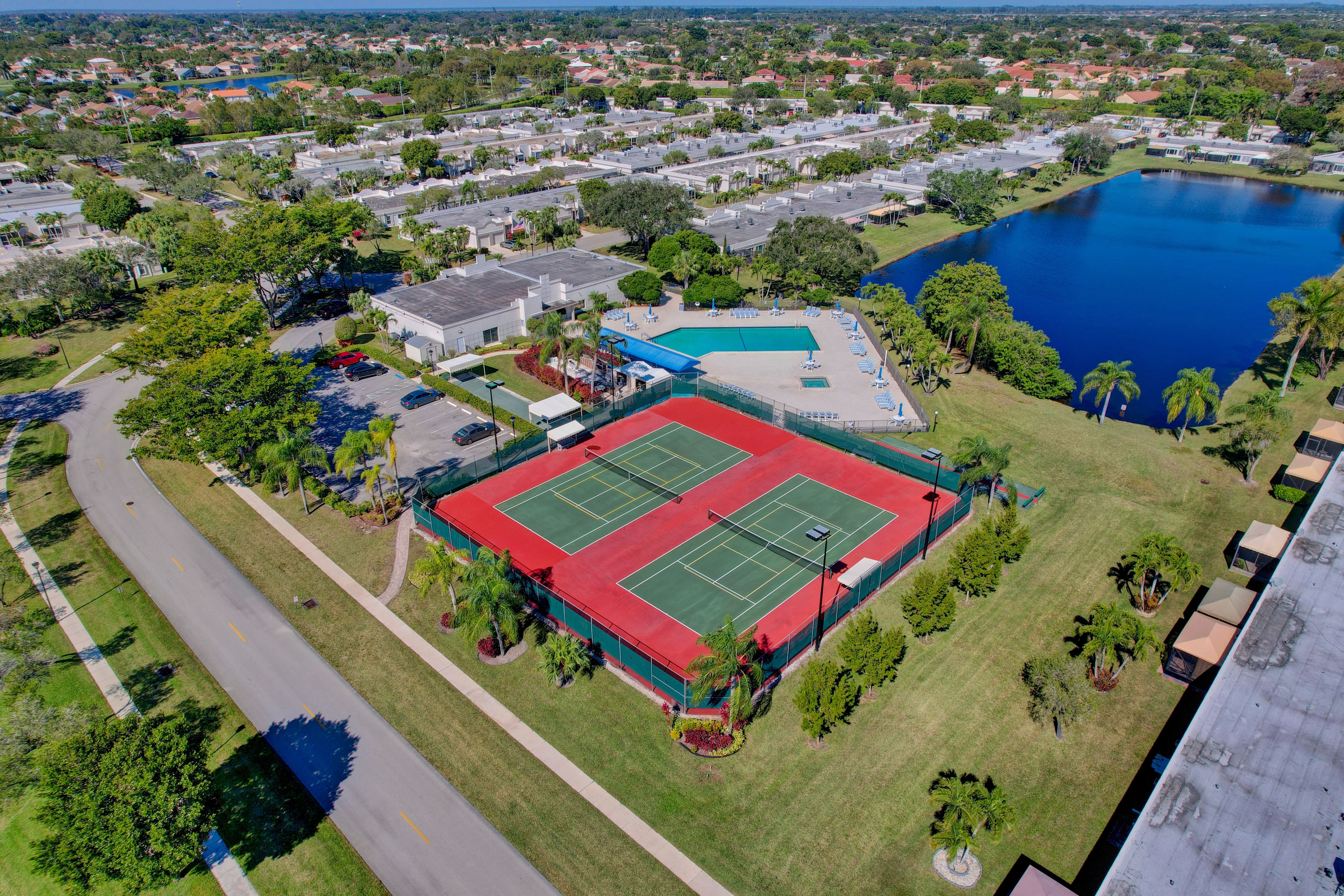Aerial view of Town Villas shared amenities and nearby homes