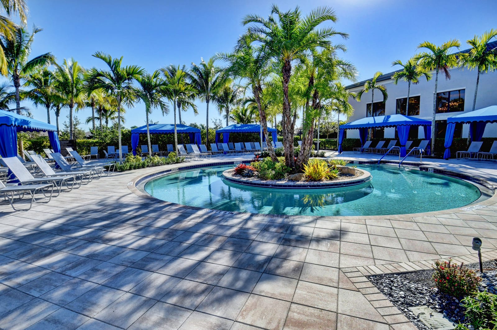Palm-lined courtyard at the Valencia Bay clubhouse