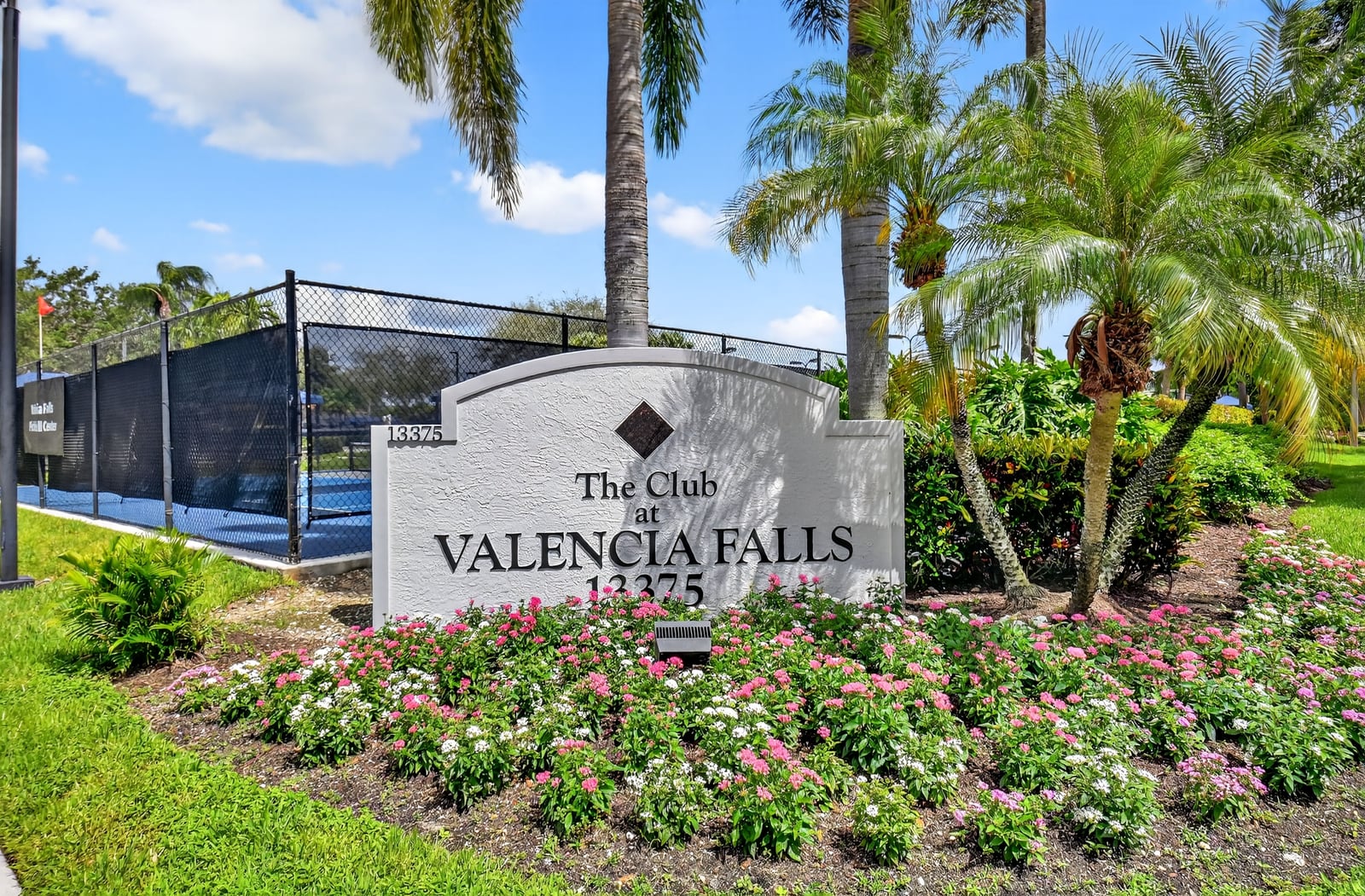 Community entrance sign at Valencia Falls in Delray Beach