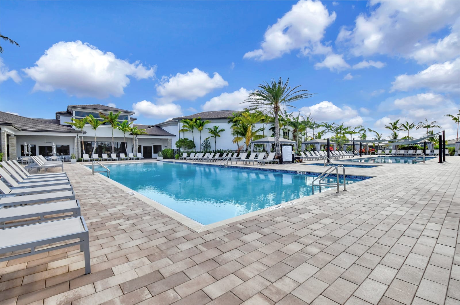 Pool and clubhouse at Valencia Grand
