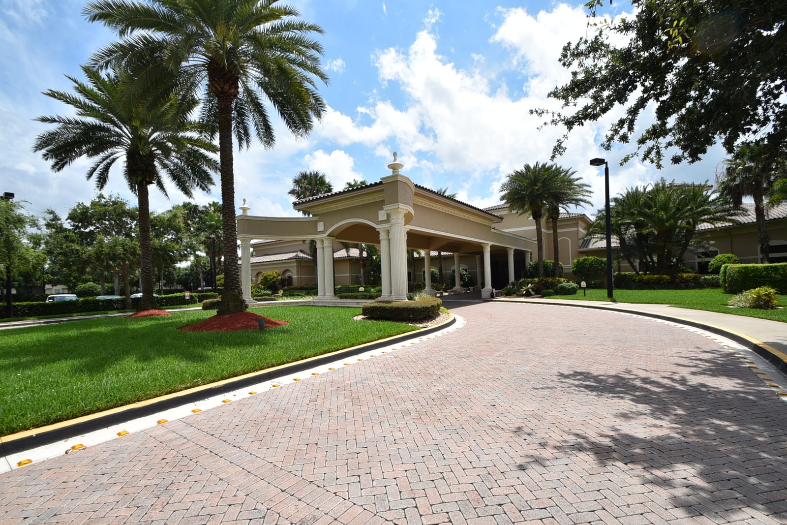 Palm-lined entrance at Valencia Shores