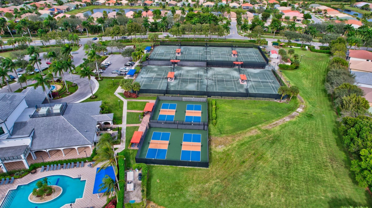 Aerial view of tennis and pickleball courts at Venetian Isles in Boynton Beach