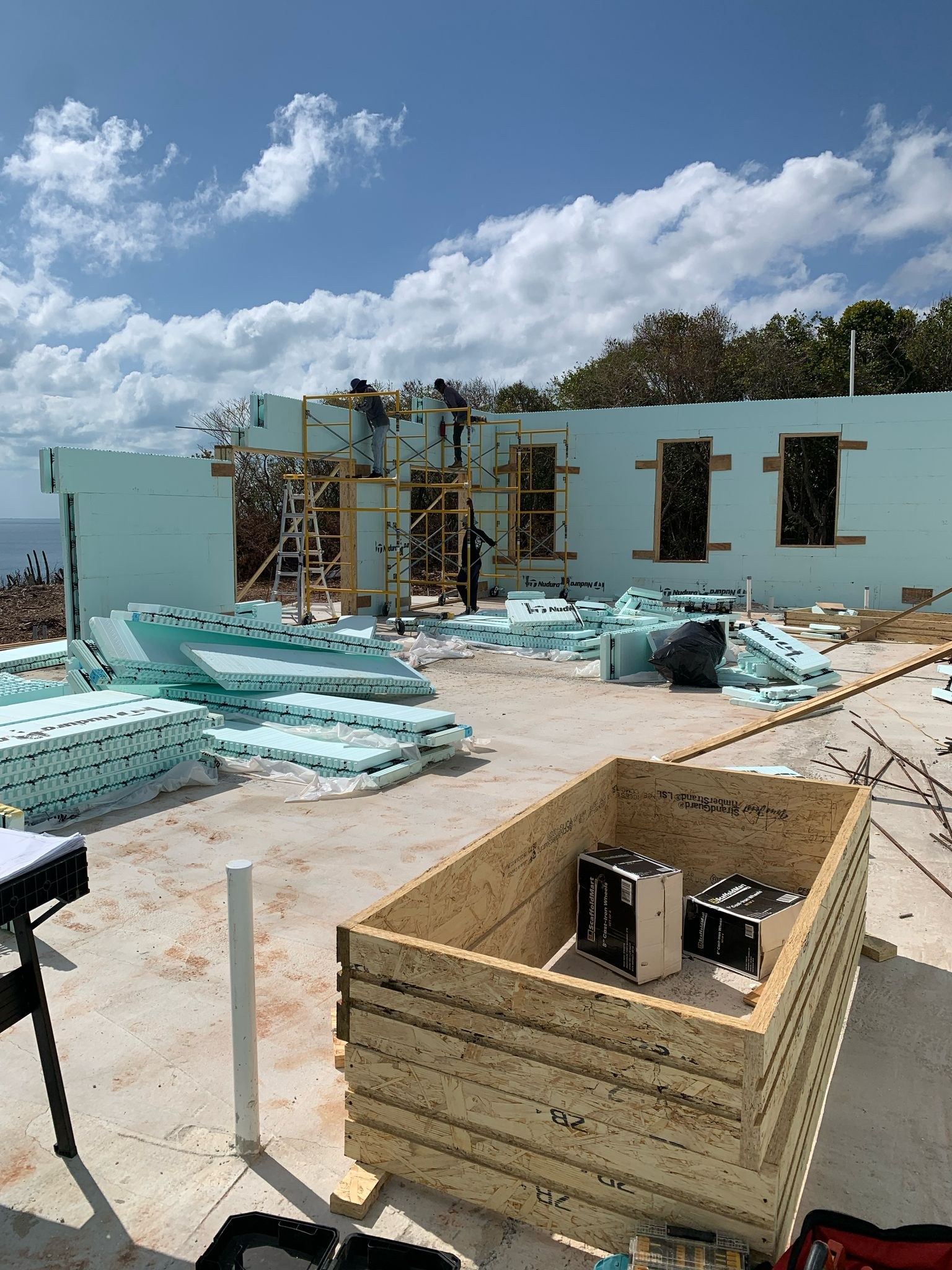 Insulated concrete form wall reinforced during construction