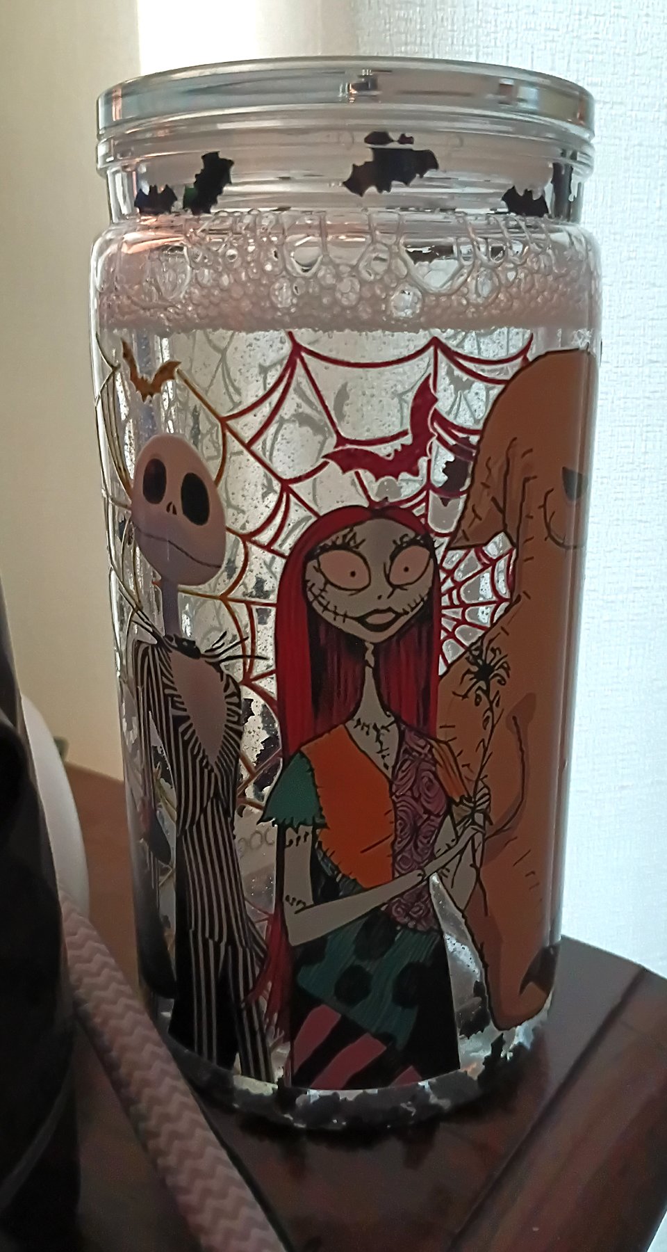 Actual Nightmare Before Christmas cup featuring Jack Skellington, Sally, and Oogie Boogie
