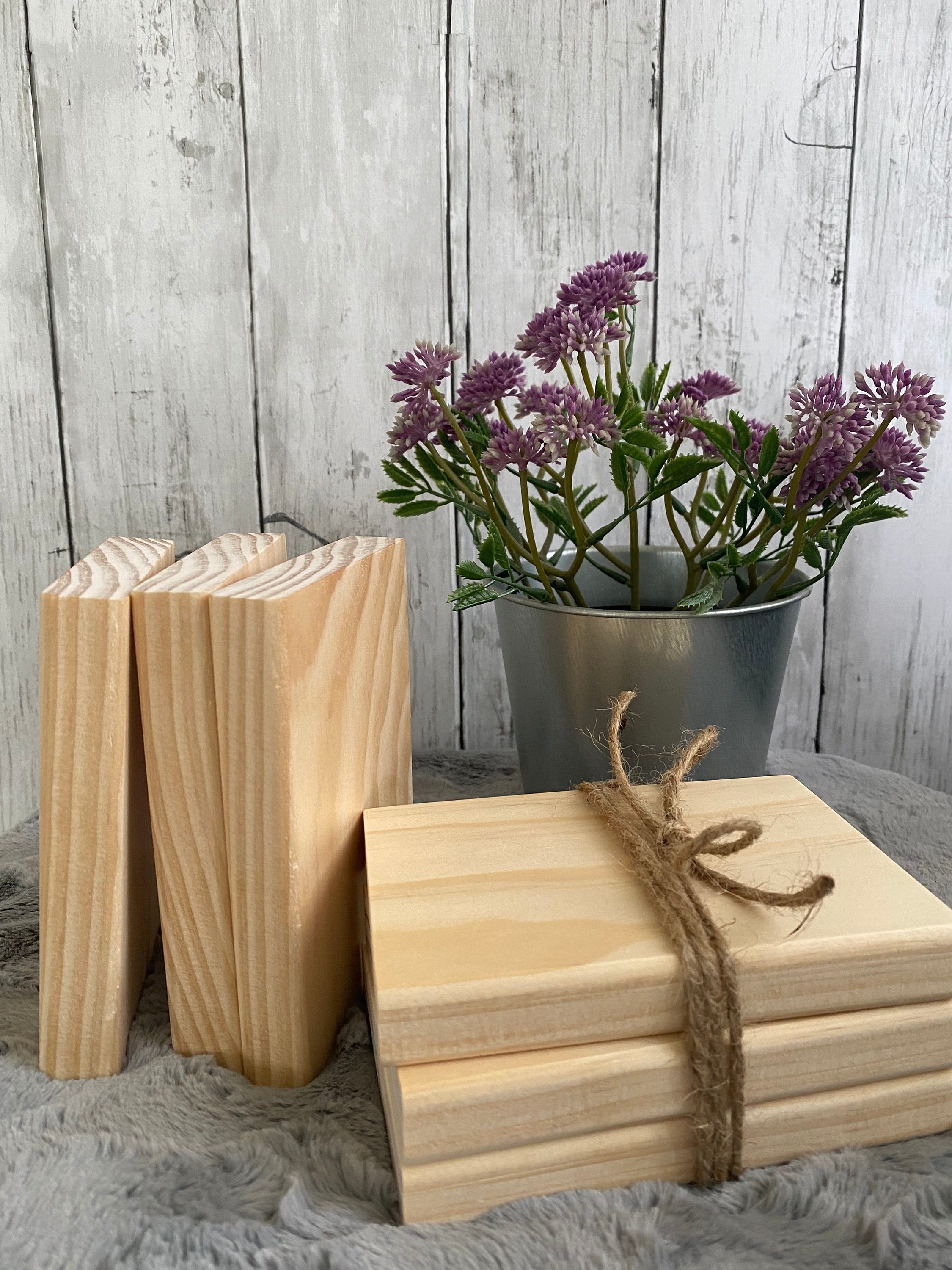 Unfinished wood book stack ready for a DIY project