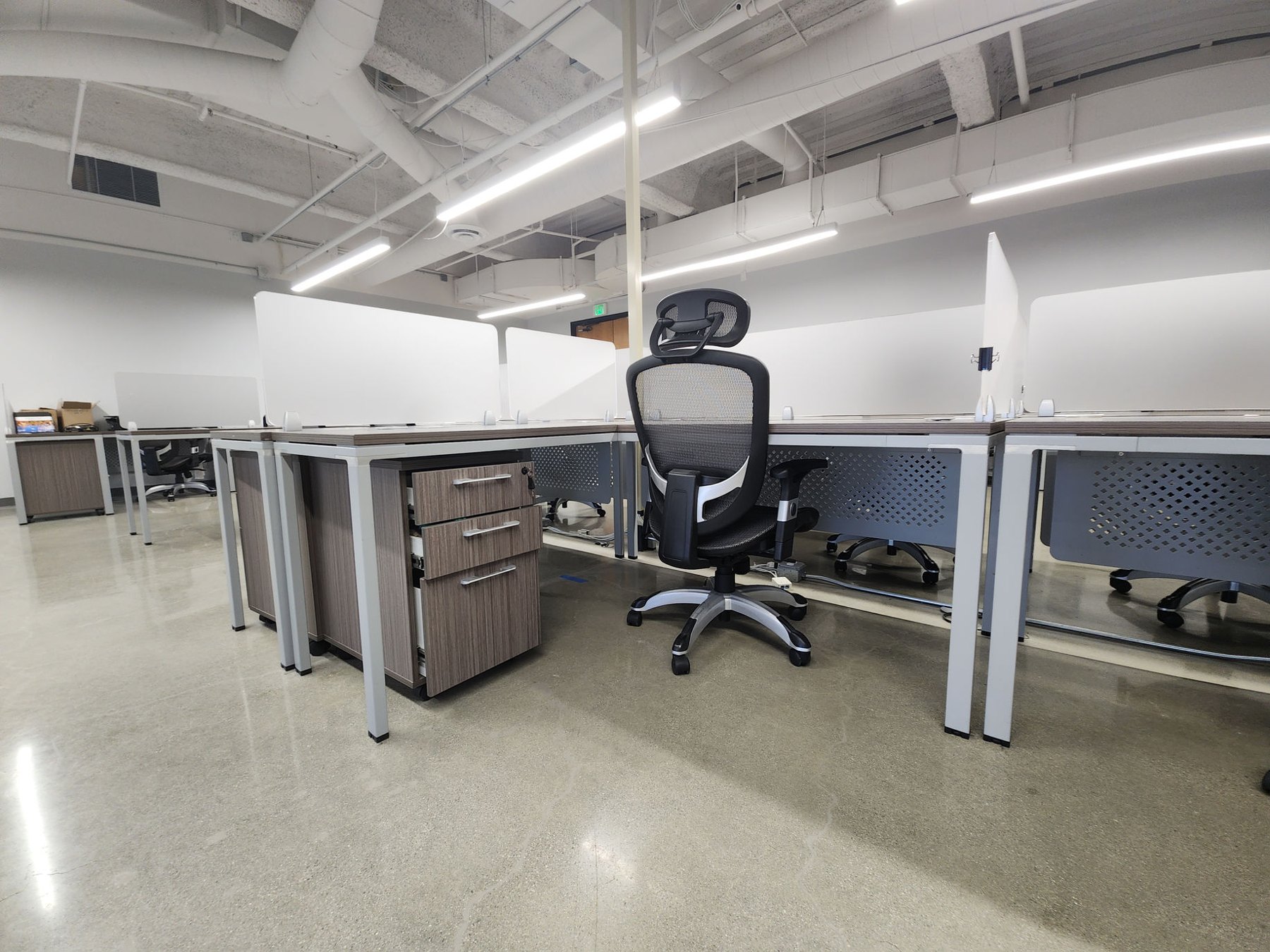 Office seating and workstation furniture in a commercial workspace