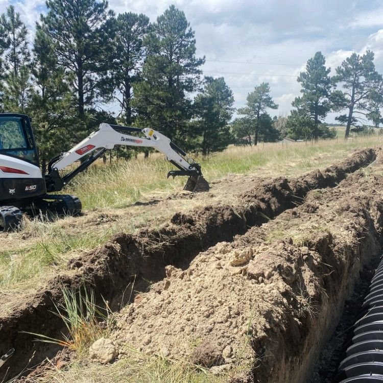 Underground septic tank being placed