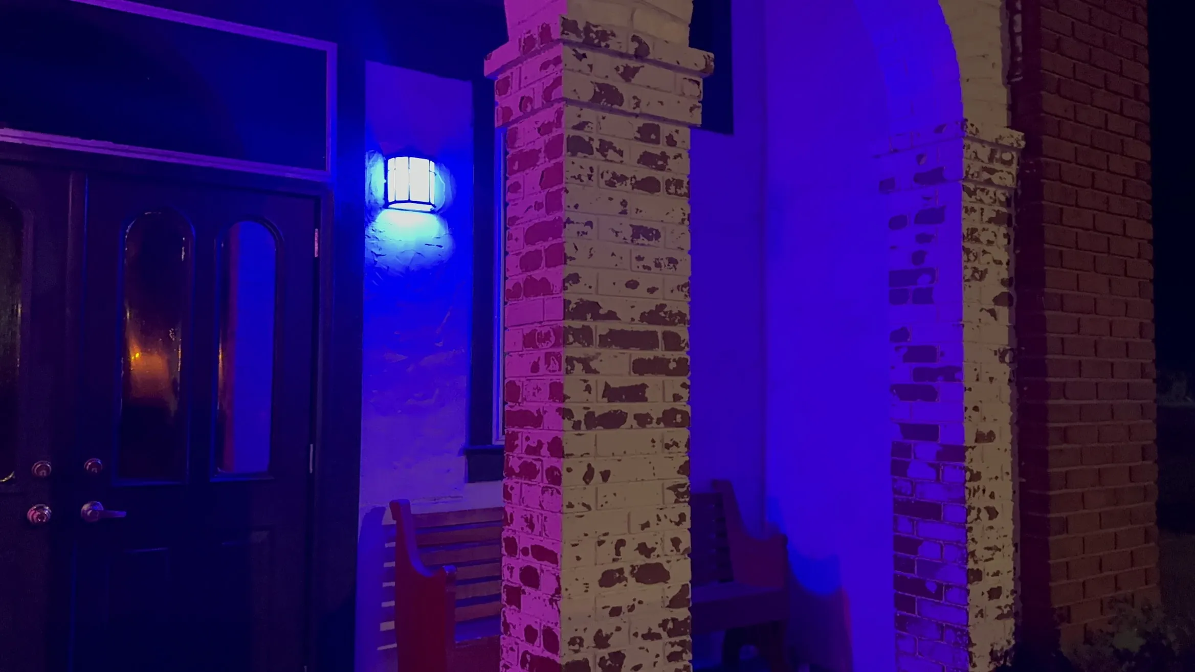 Badu Lounge entrance lit at night