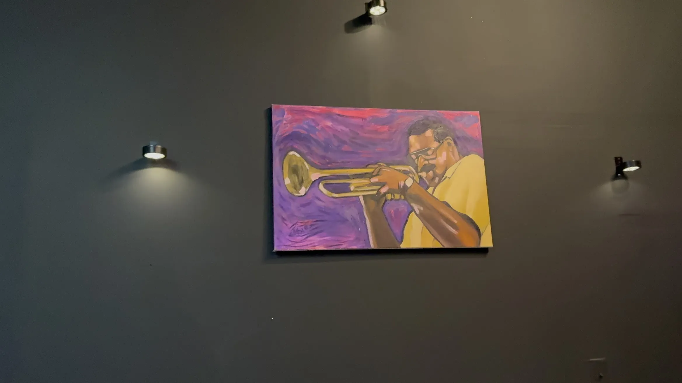 Jazz artwork displayed inside Badu Lounge