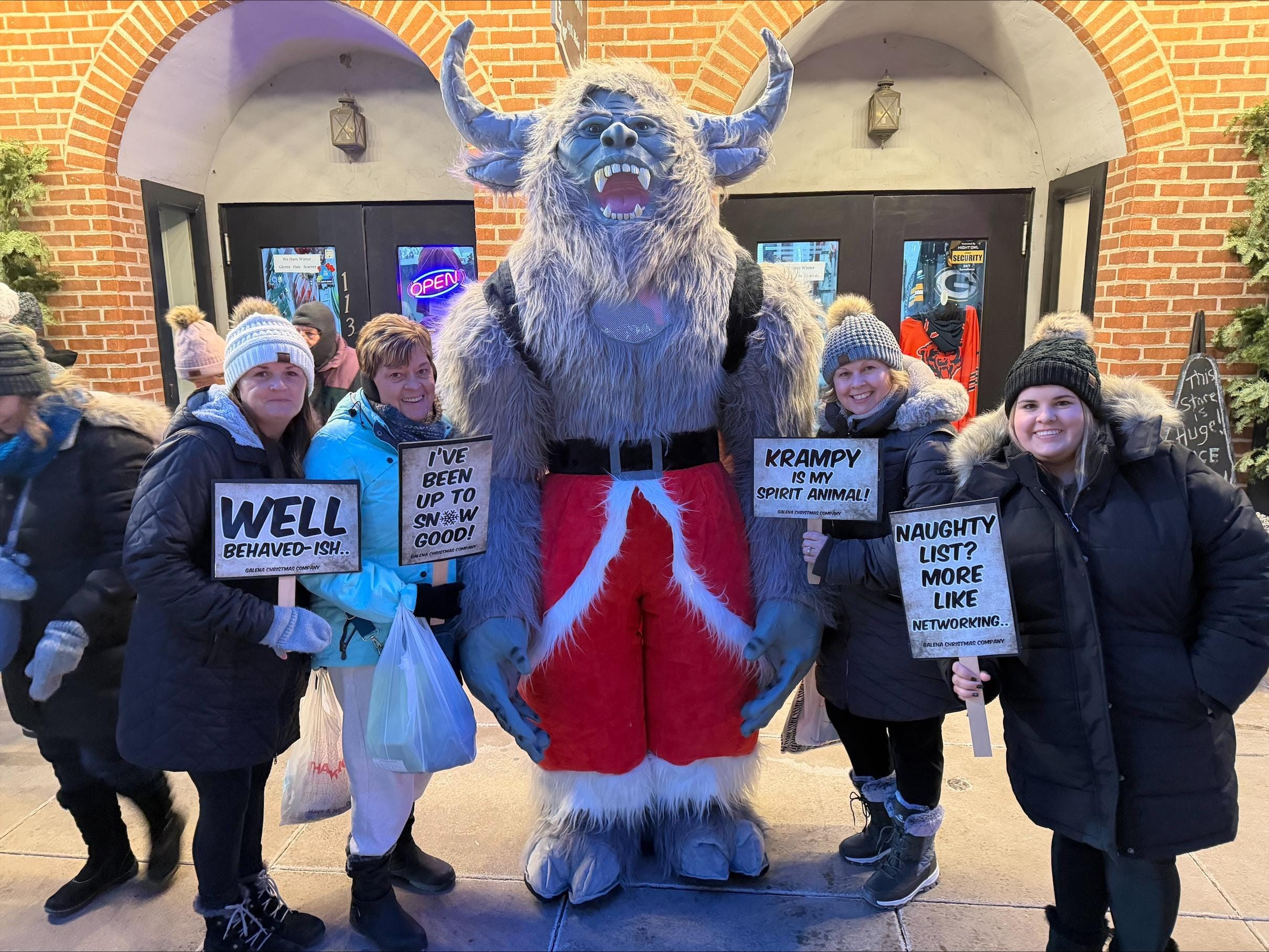 Krampus meeting visitors in Galena