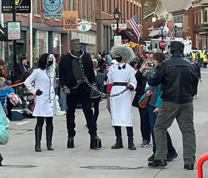 Frankie Stein and fellow costumed characters on Galena Main Street