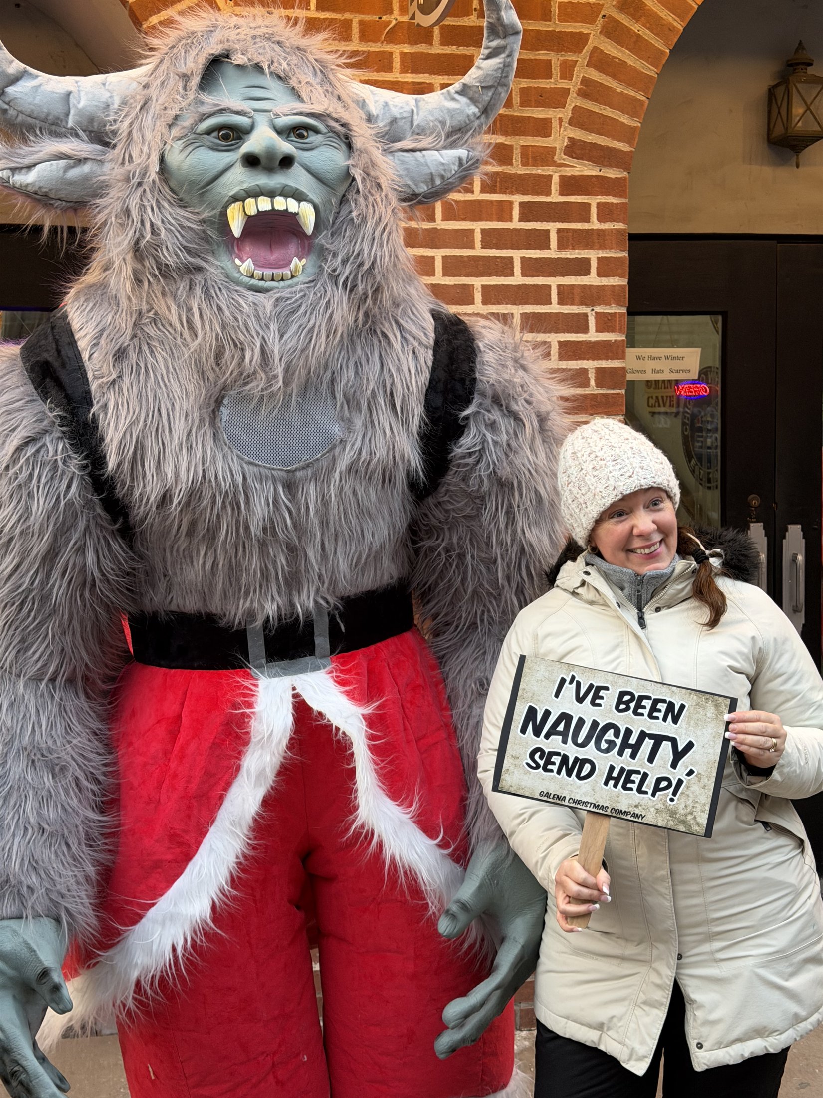 Krampy with visitors at Country Crafts & Sports during Galena’s Night of Luminaria and Living Windows, photo 2