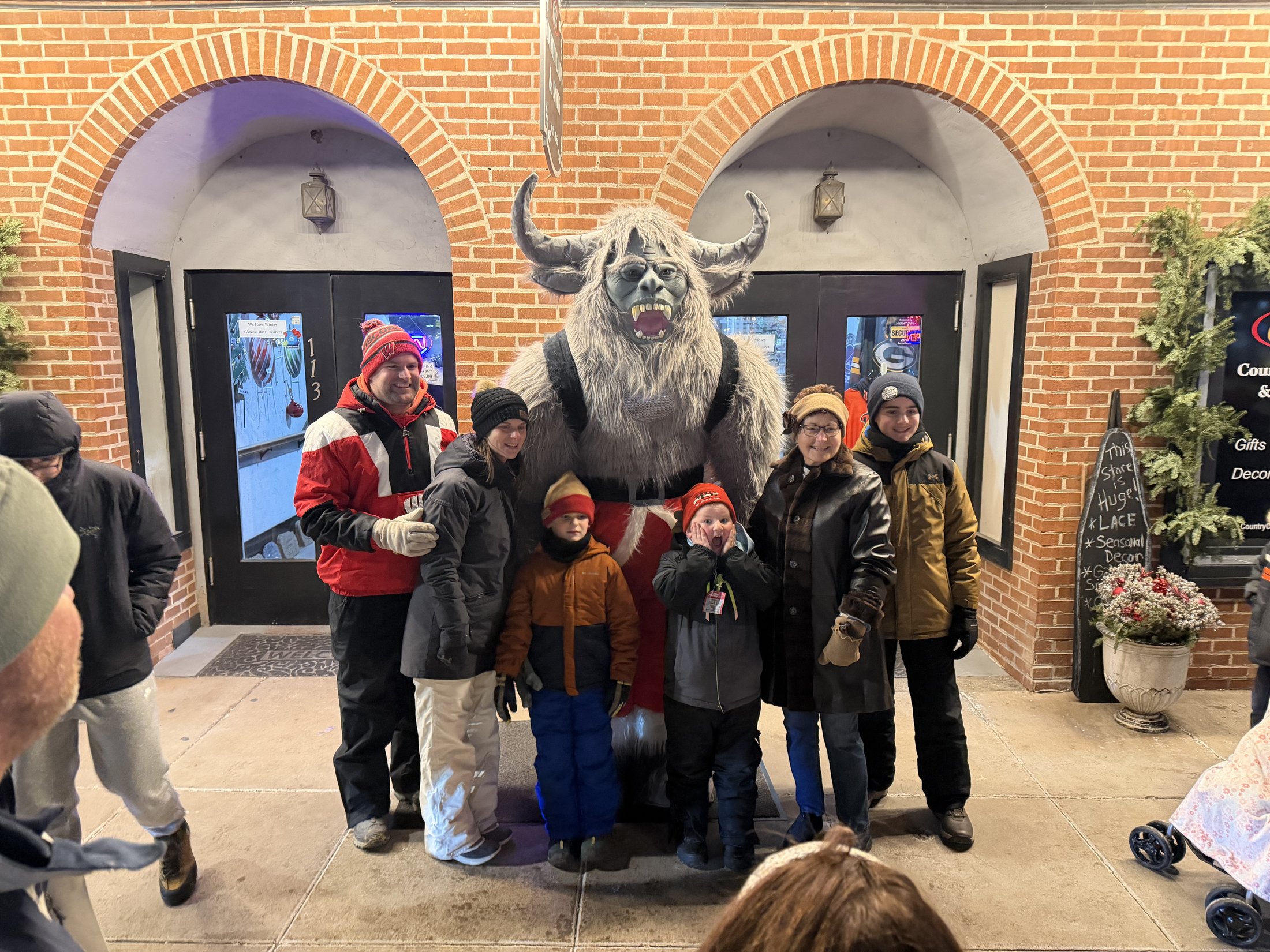 Krampy with visitors at Country Crafts & Sports during Galena’s Night of Luminaria and Living Windows, photo 9