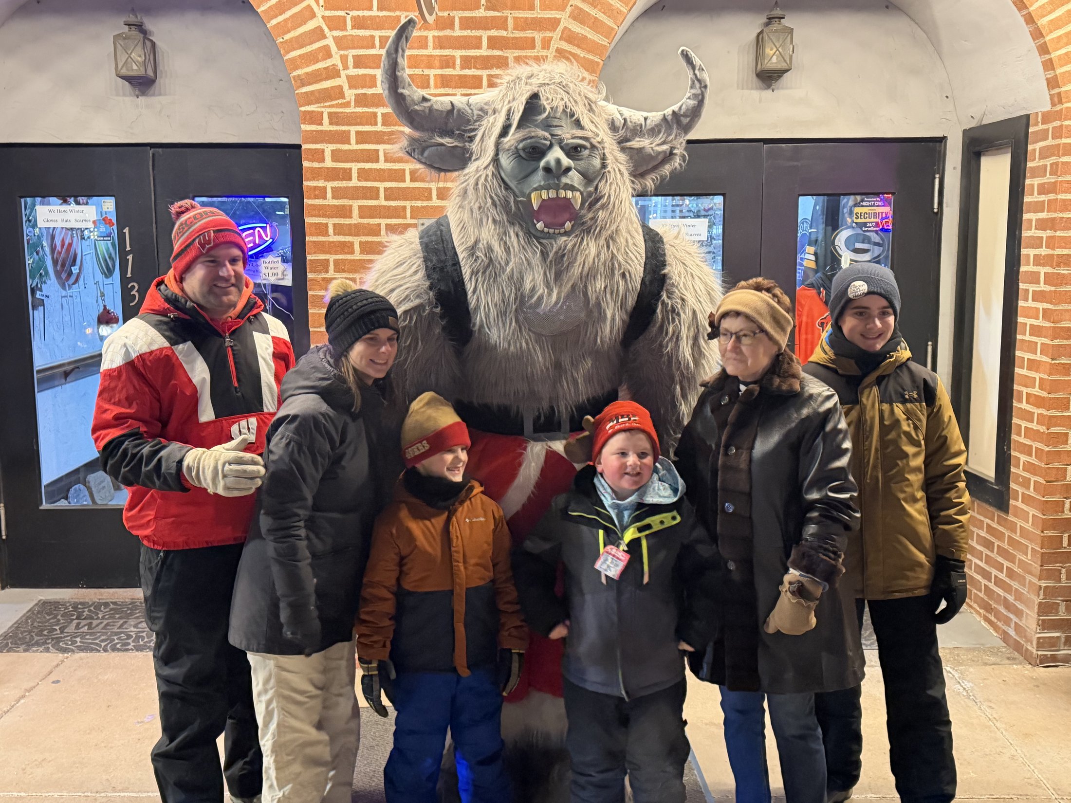 Krampy with visitors at Country Crafts & Sports during Galena’s Night of Luminaria and Living Windows, photo 10