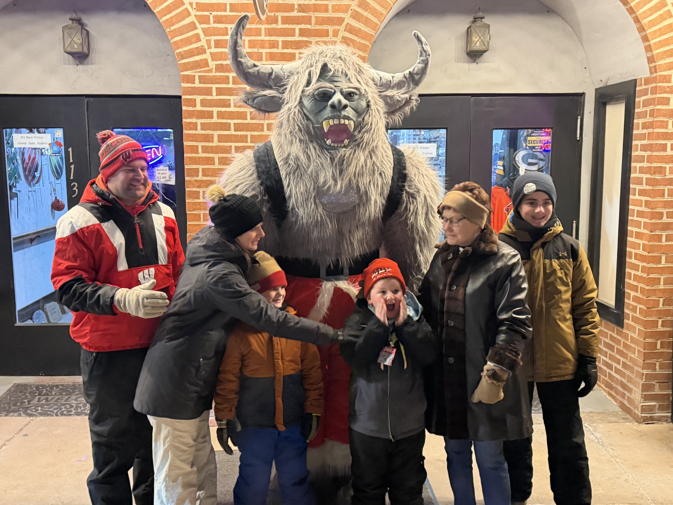 Krampy with visitors at Country Crafts & Sports during Galena’s Night of Luminaria and Living Windows, photo 11