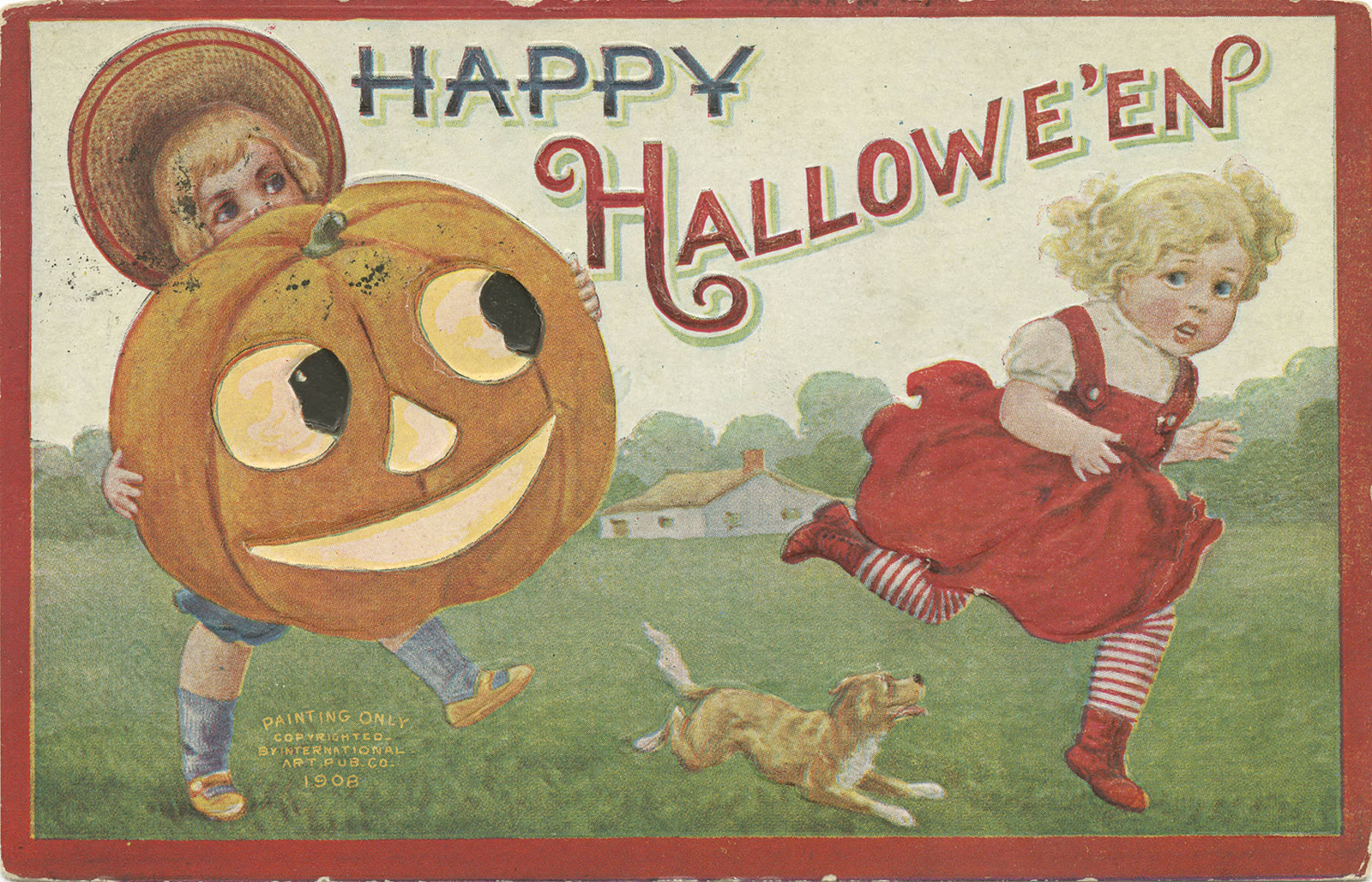 Two children carrying a large smiling jack-o’-lantern on a 1909 postcard