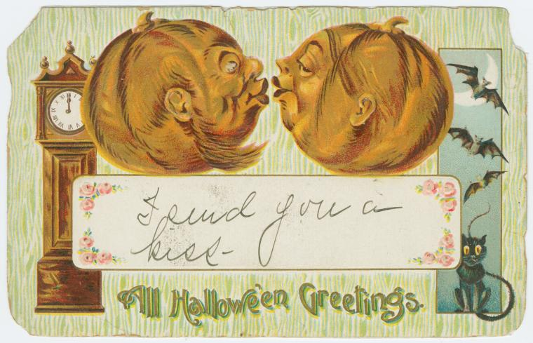 Two pumpkin faces leaning toward a kiss on a 1908 Halloween greeting