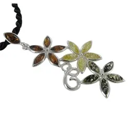 Tri-color Baltic amber pendant showing natural variation