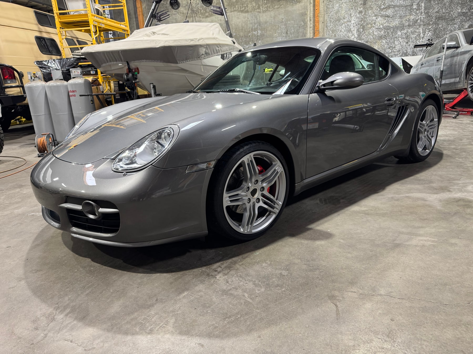Porsche with a freshly detailed finish inside Jim's Auto Lab
