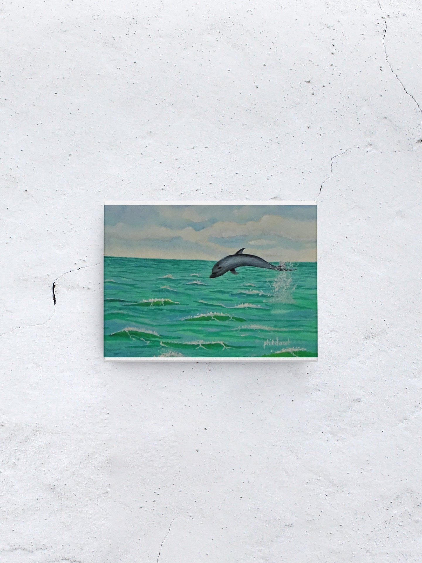 Dolphin diving in the Emerald green water, view 5