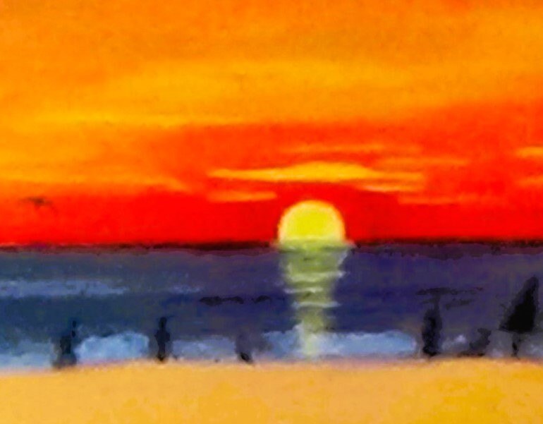 People watching the Tropical sunset from Florida beach.