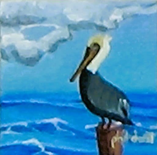 Pelican on a post