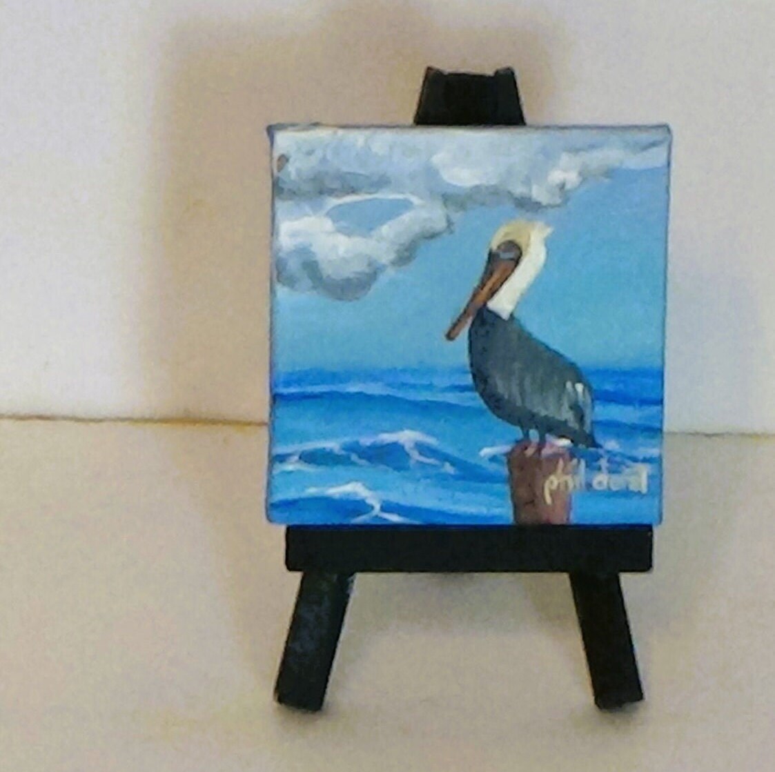 Pelican on a post, view 2