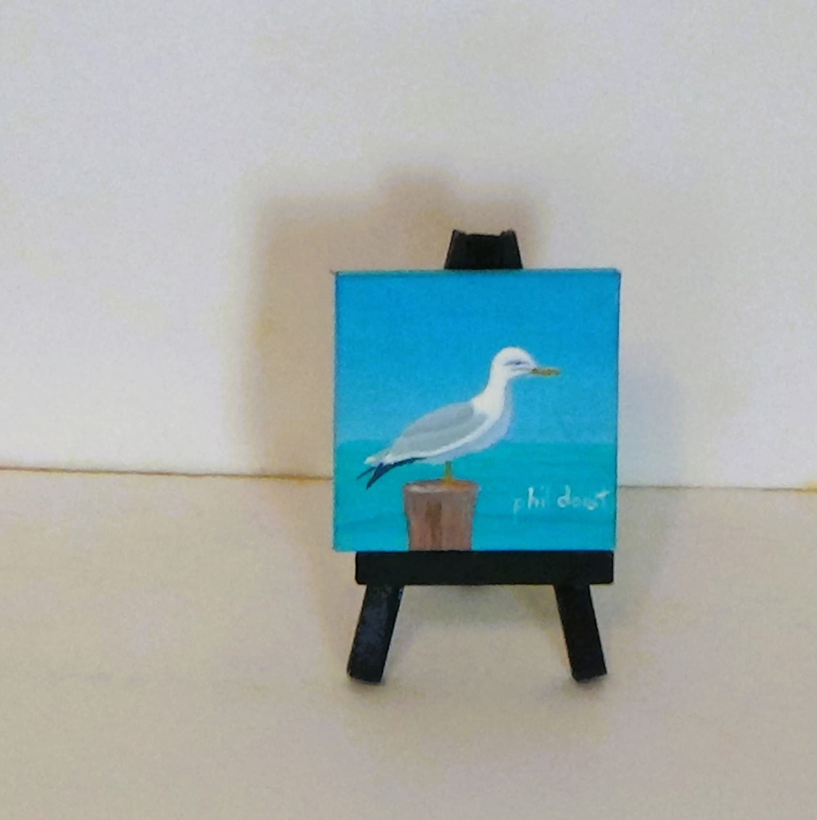 Seagull on a post