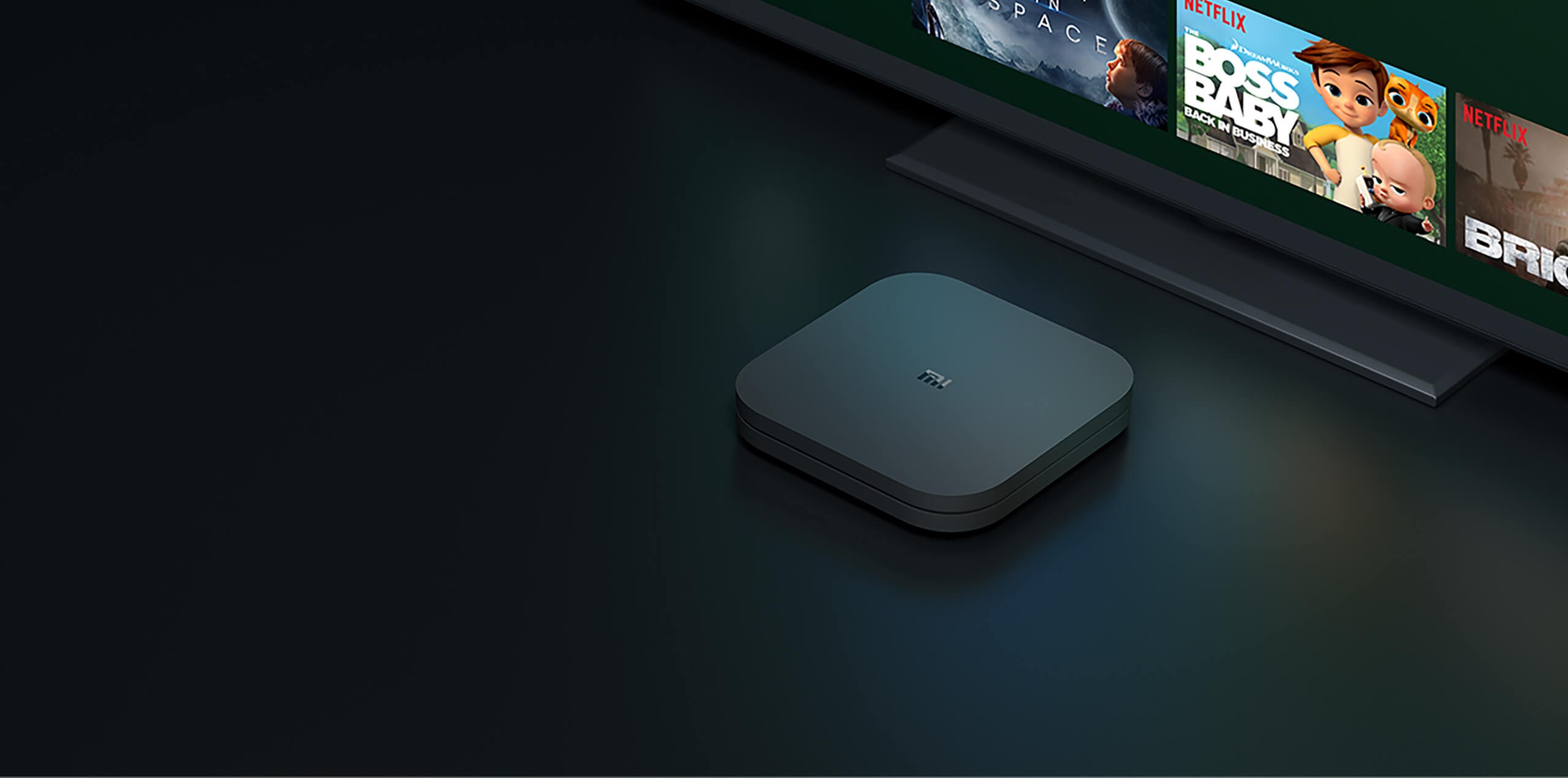 Streaming device in front of a television displaying a content interface