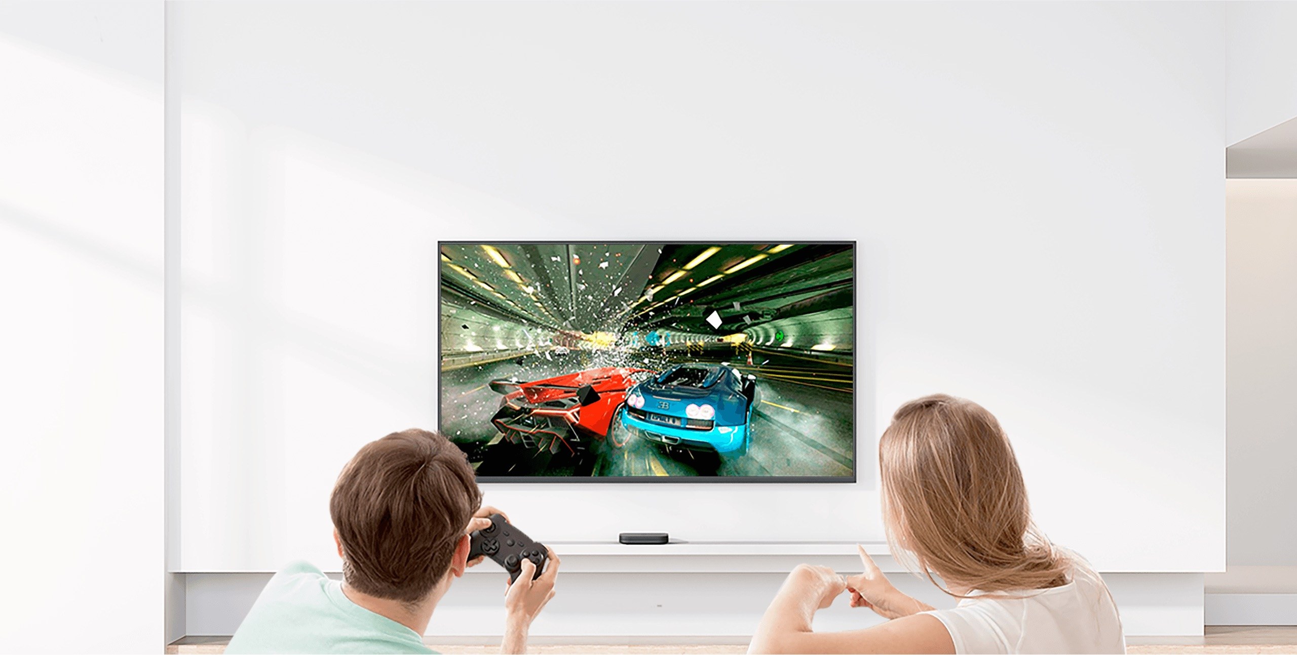 Streaming device in a living room with television content on screen