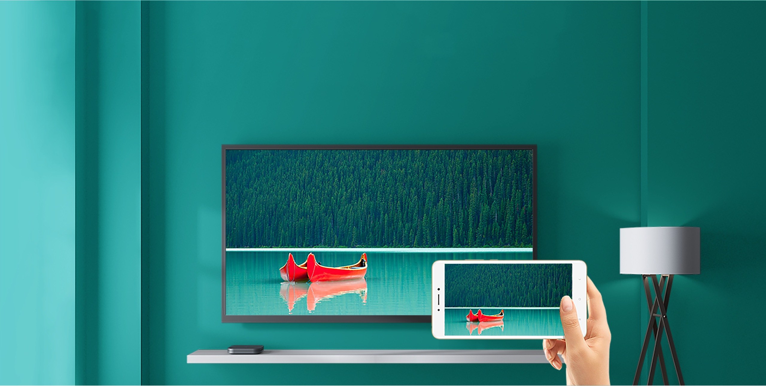 Television and tablet showing the same image through screen casting