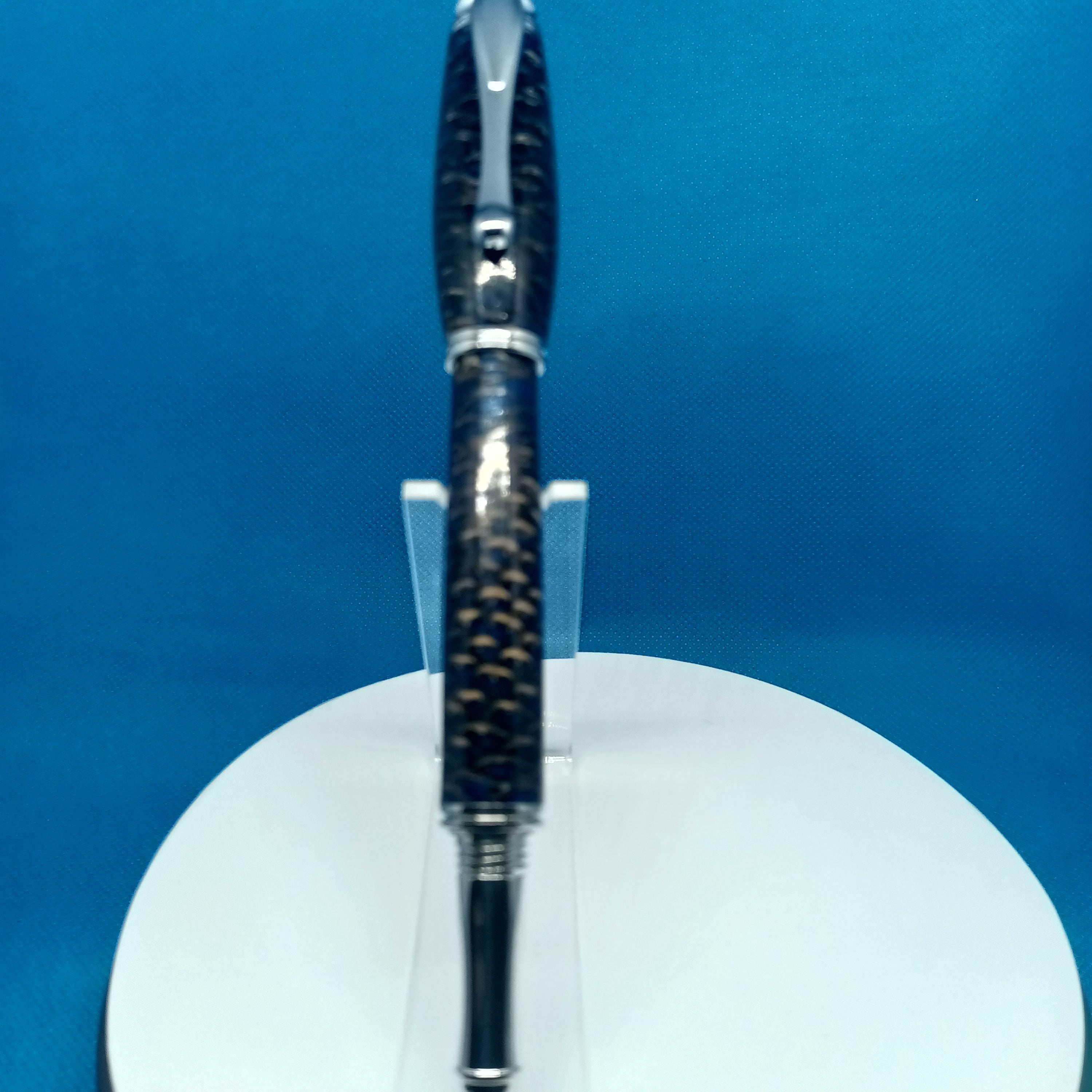 Handmade pinecone rollerball pen with warm wood tones