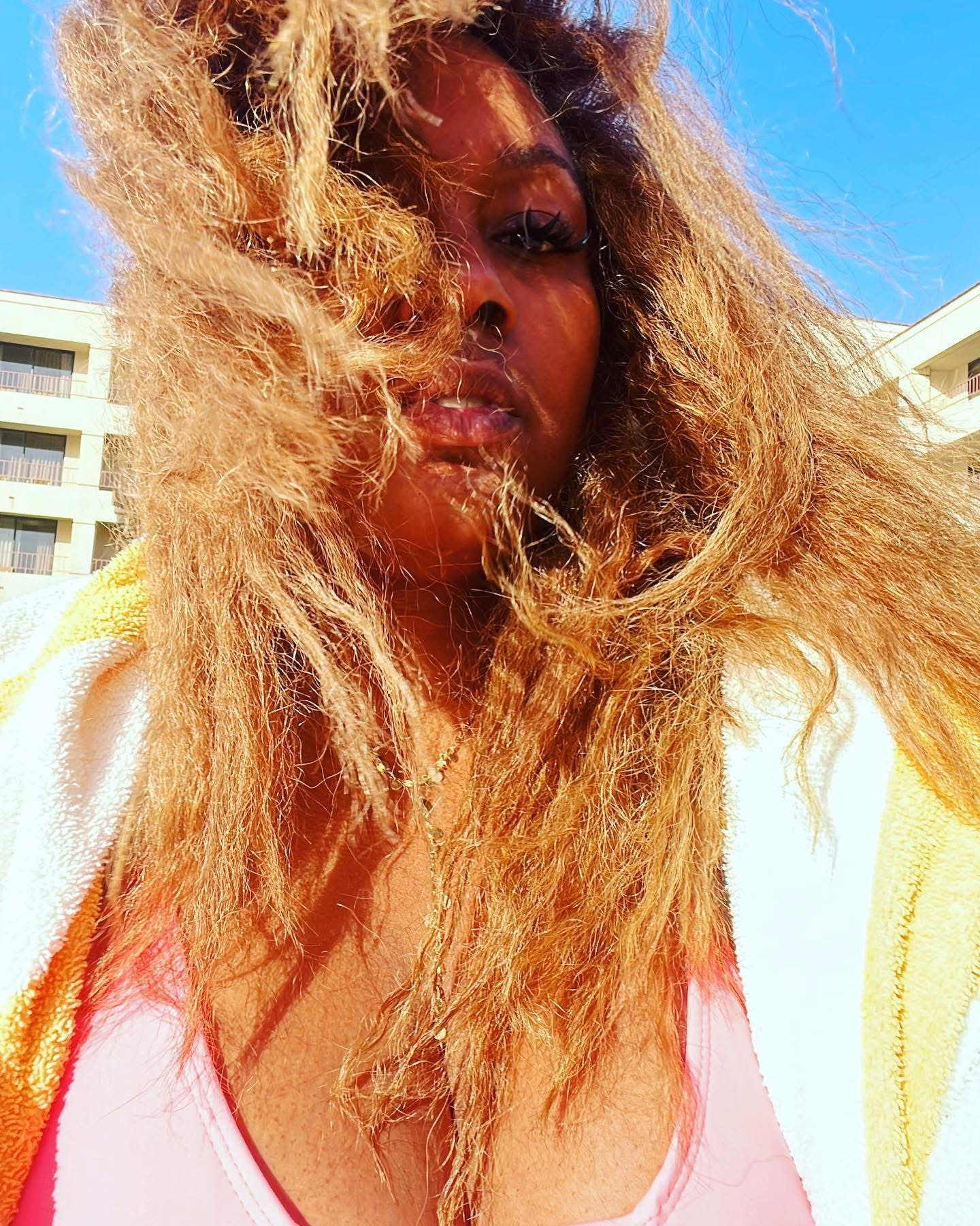 Lysette Titi in a sunlit close-up portrait