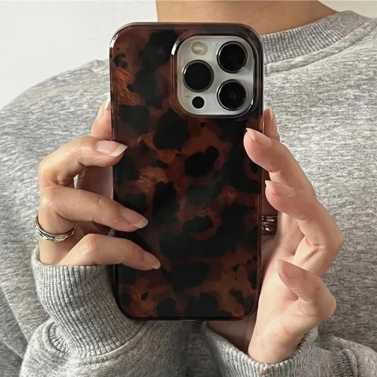 Retro Amber Leopard Print iPhone Case Laser Texture Shockproof Soft Cover