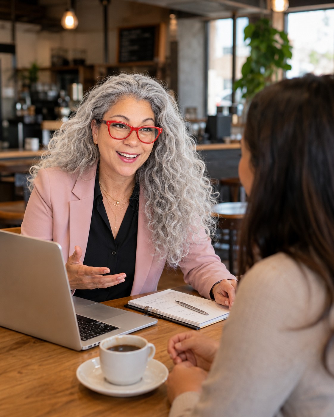 Jackie Beaman giving personal marketing guidance to a business owner