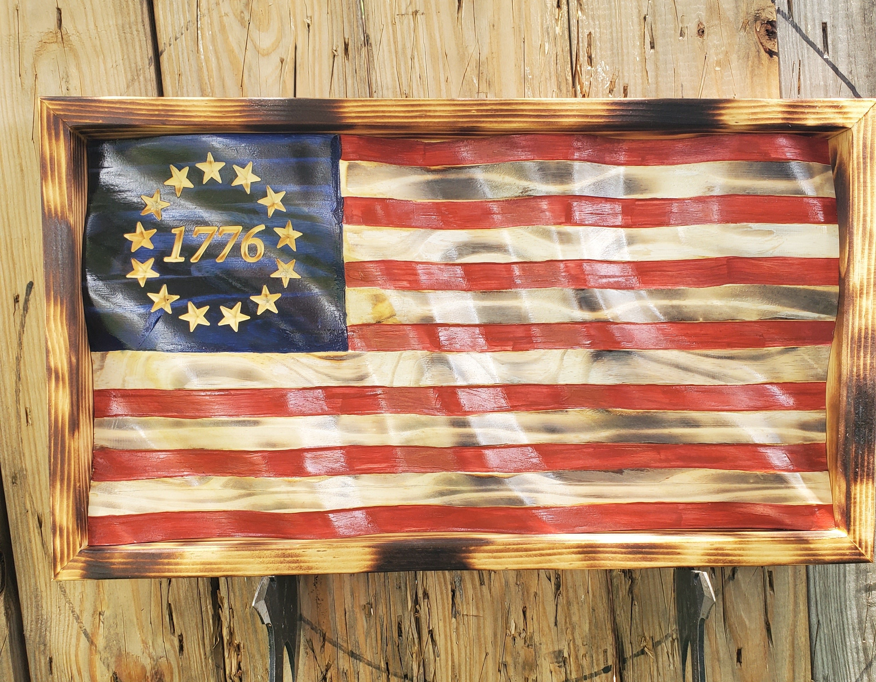 Handmade wood flag showing the texture and grain of natural pine