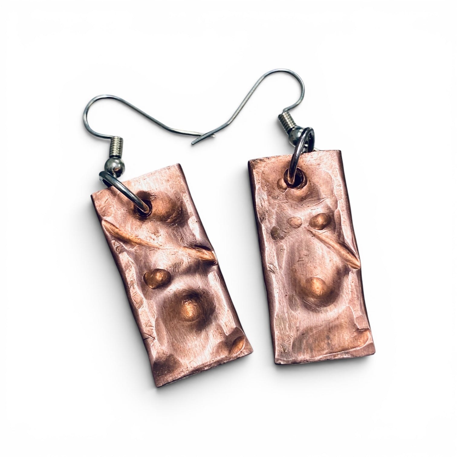Handmade raw copper earrings with hammered texture