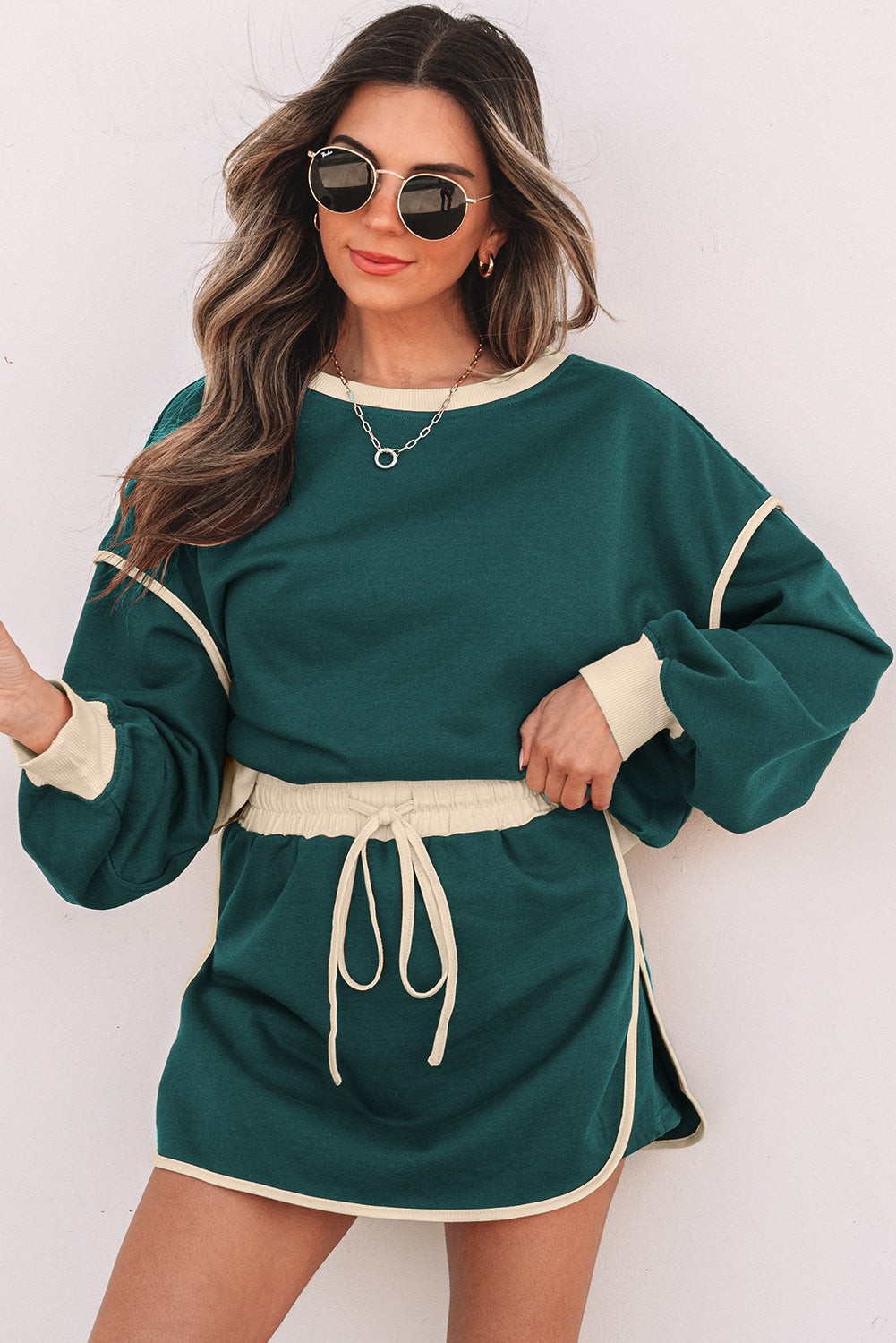 Evergreen pullover and skort two-piece set for casual styling