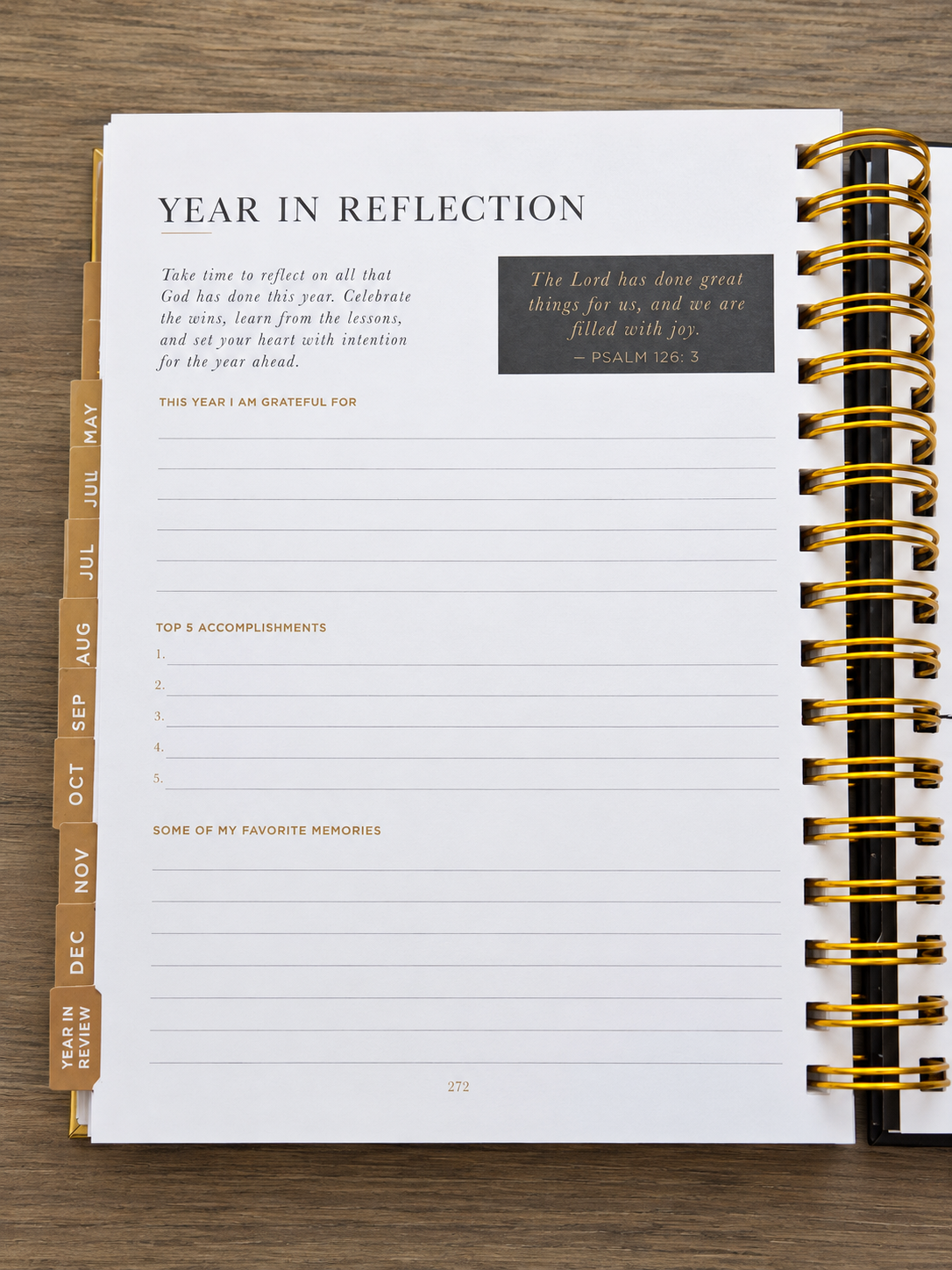 Christian C.E.O. Planner opened to a year-in-reflection page