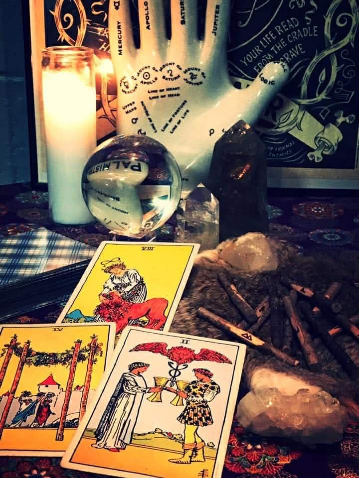 Candlelit altar prepared for a reading at Luna Enchanted Shoppe