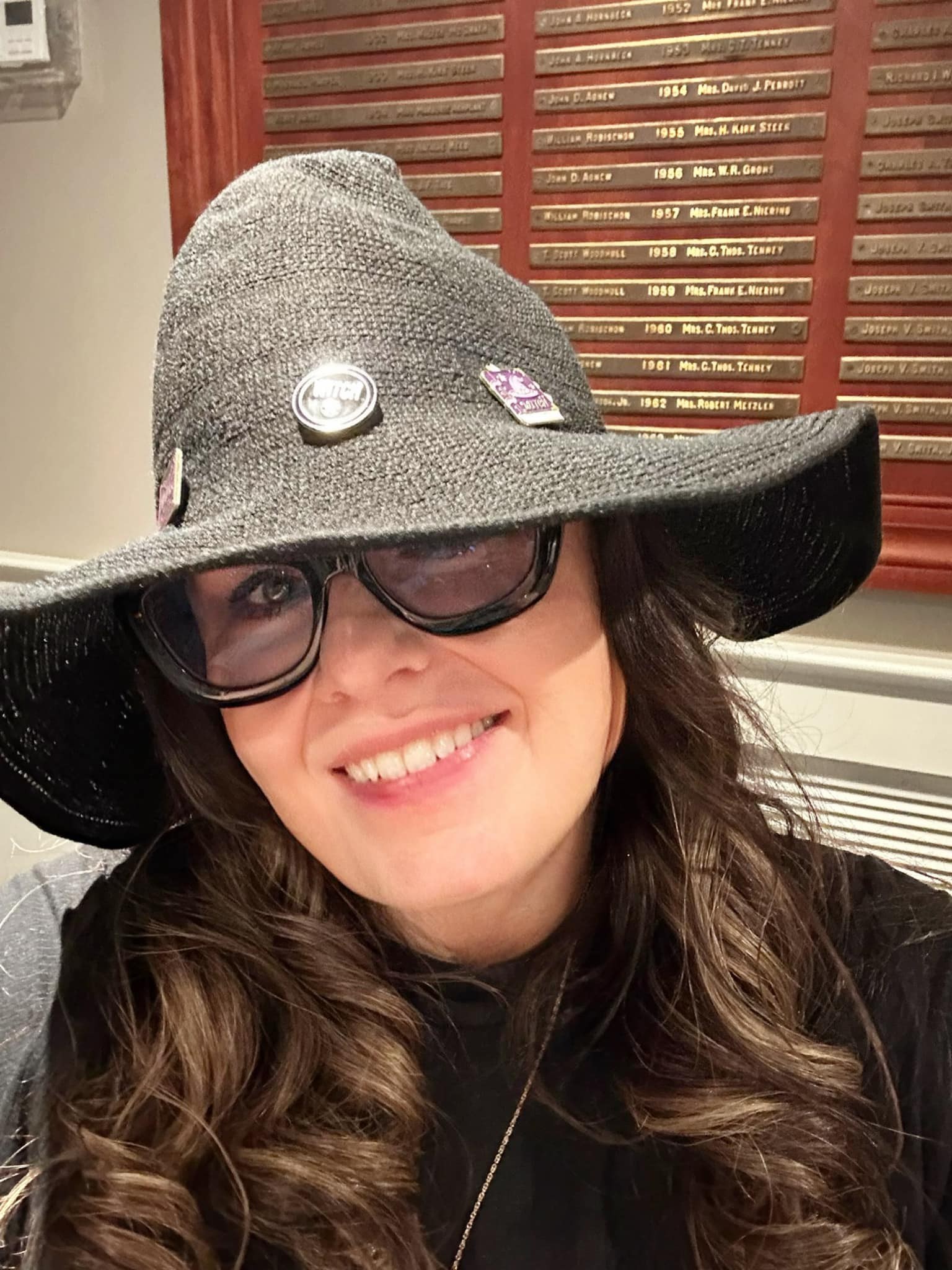 Luna wearing a witch hat