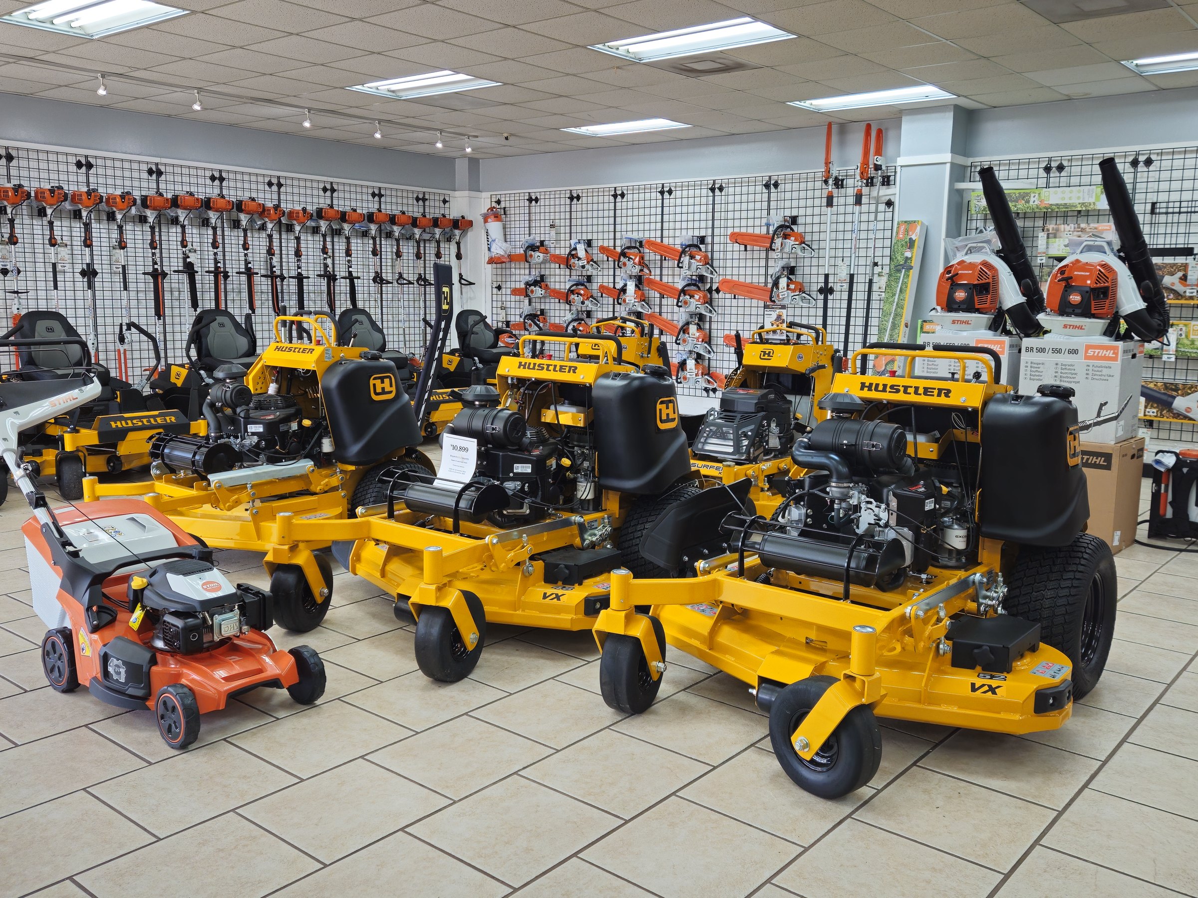 Hustler mowers and STIHL outdoor power equipment on display at A-1 Tractor and Mower
