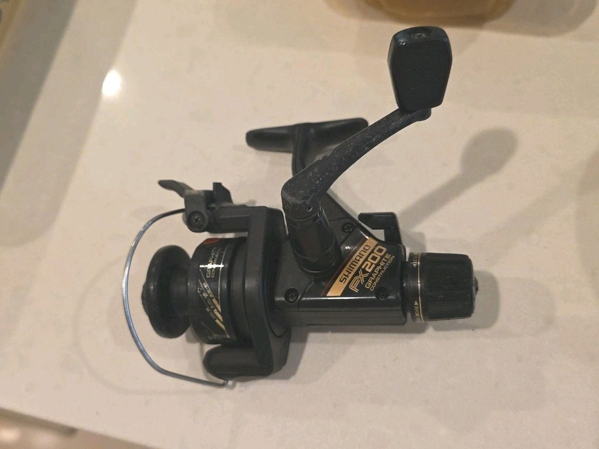Fishing SHIMANO FX200 Graphite Spinning Reel with Rear Drag & Quickfire II ￼ Nic
