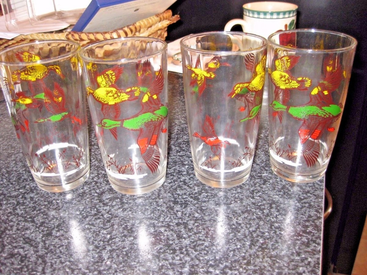 Set of 4 Mid century Modern Bar Ware in the Hunting Duck Design bought at Orvis